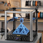Atlas XL 3D printer on a steel workbench in a maker workshop with calipers and a printed part