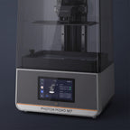 Close-up of the Aura Max resin vat, build platform, touchscreen and power button