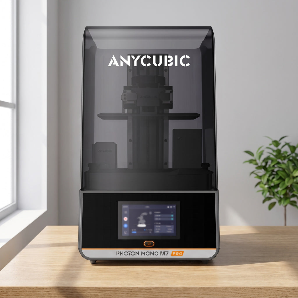 Aura Max Pro resin 3D printer on a light oak desk in a bright room