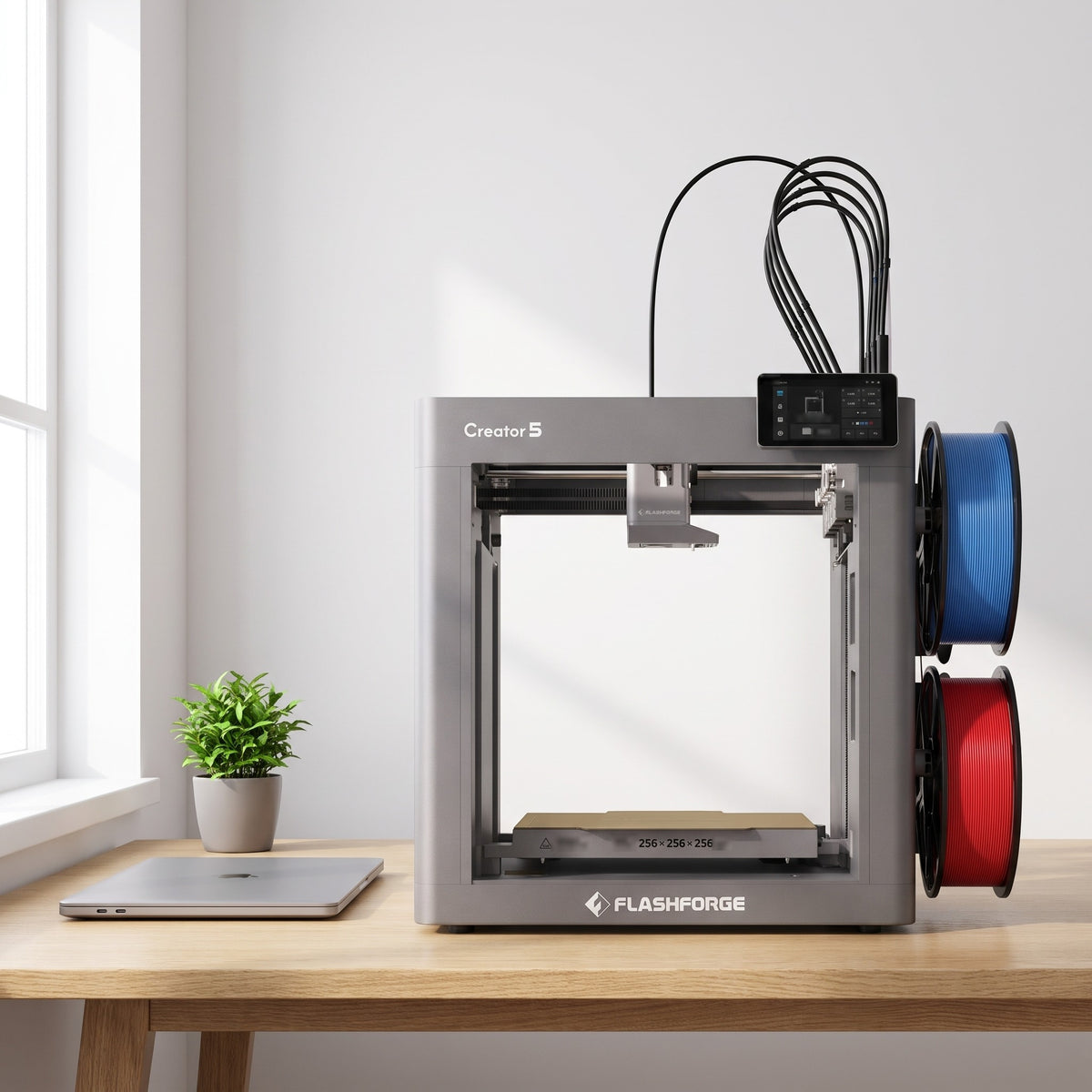 Fusion Multi 3D printer on a light oak desk in a bright home office