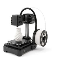 NeoCraft+ compact beginner 3D printer with white filament spool and a printed white vase, on a white background