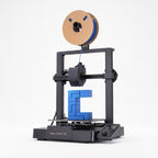 Nova X3 open-frame 3D printer with blue filament spool and a blue printed part, on a white background
