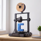 Nova X3 3D printer on a light oak desk in a bright home office