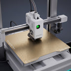 Close-up of the Spark Color print head above the textured PEI build plate