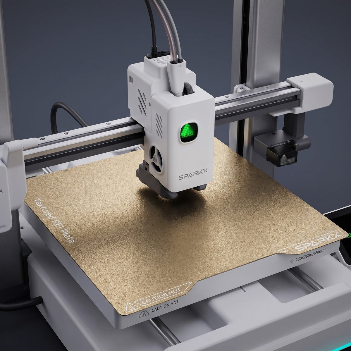Close-up of the Spark Color print head above the textured PEI build plate