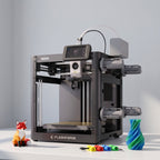 Spectra Color 3D printer with a multicolor low-poly fox, spiral vase and color-coded cable clips