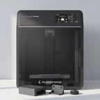Vault Pro 3D printer with dark-gray printed functional parts: an enclosure, a bracket and a gear